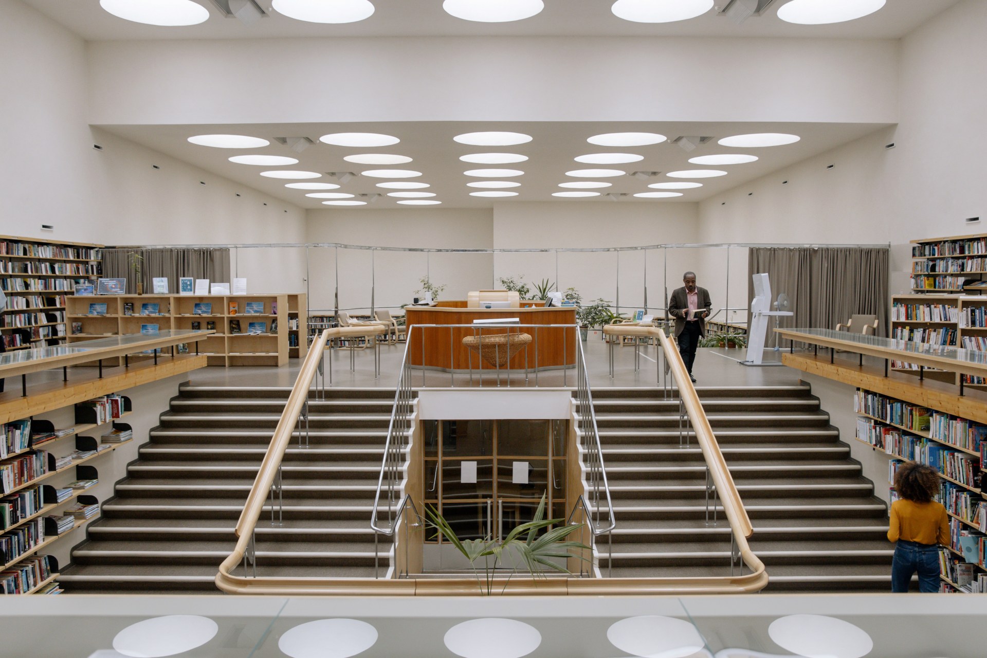 Library ceiling outfitted with acoustic ceiling and wall panels installed by ASI Architectural