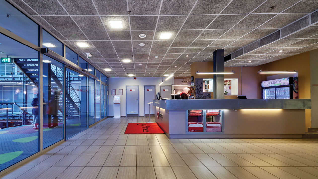 A business lobby with StrandTec paneled ceilings
